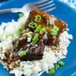 asian style short ribs - made in the slow cooker. Super easy to prepare and a delicious weeknight dinner recipe. The short ribs are fall off the bone tender